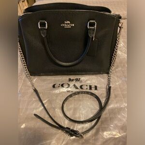 Black colored Coach satchel and shoulder bag